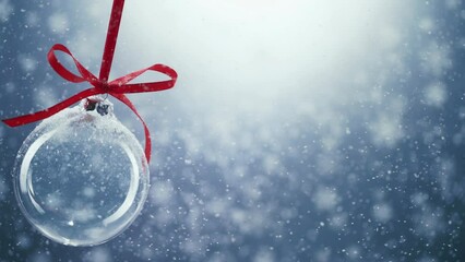 Hanging glass christmas balls swing in snow - Powered by Adobe