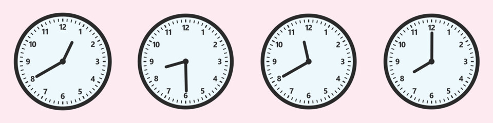 Close-up of a set of four clocks showing the different time