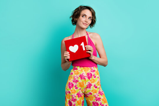 Photo of charming lovley girl wear pink trendy clothes look up empty space dream popularity isolated on cyan color background