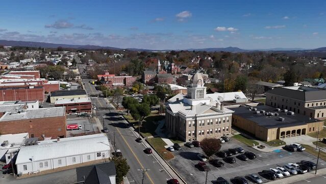 A slowly moving forward aerial establishing shot of the Wytheville, Virginia courthouse.  	