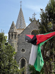 Palestine flag in front of a church 