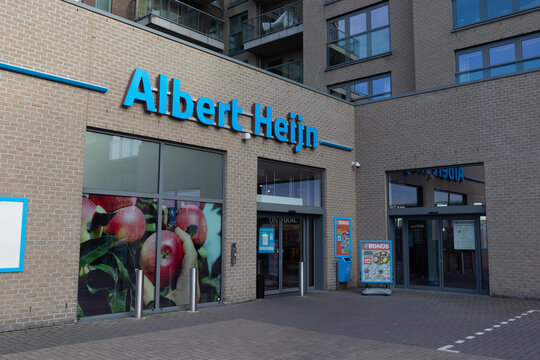 DENDERMONDE, BELGIUM; 8 NOVEMBER 2023: Exterior view of an Albert Heijn supermarket in Flanders. It is the biggest supermarket chain in the Netherlands and also has 75 stores in Flanders. Copy space.