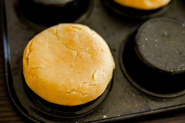 Elegance in Baking: Close-Up of Shortcrust Dough Formed in Tart Shell