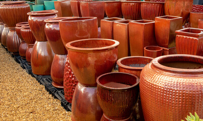 Glossy ceramic flower pots and plant pots for plants. - obrazy, fototapety, plakaty