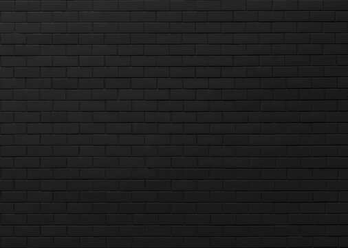 Black brick wall background. Brick wall is painted with black paint. Dark abstract background for design.
