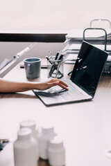 Medical technology concept. Doctor working with mobile phone and stethoscope in modern office