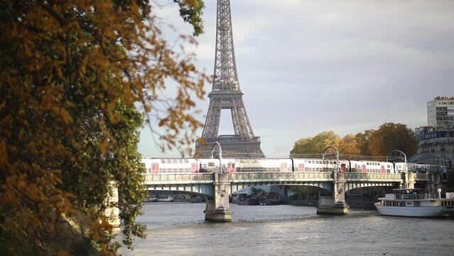 Scenic view to the Eiffel tower over the river Seine on a nice autumn day in Paris