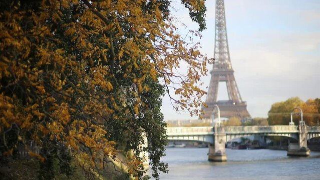 Scenic view to the Eiffel tower over the river Seine on a nice autumn day in Paris