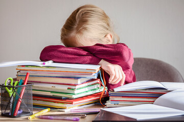 Sad Stressed School Child Pupil needs Help with Homework Sitting at Desk with Pile Books and...
