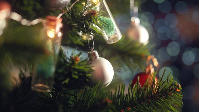 Close-up, Elegant Christmas tree in silver bauble with bokeh lights on Christmas tree, Christmas and new year concept.