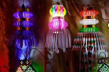 Hanging Diwali Lamp (Kandil) - Diwali Festival Background, Colourful lanterns made by paper eco friendly material akashkandil hang shop sell celebrating diwali festival in Pune, Maharashtra, India.