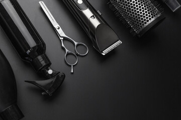 Barbershop concept. Hairdressing tools on dark background top view space for text. Hair extensions, materials and cosmetics, hair care, wig. Hairstyle, haircut in salon. - obrazy, fototapety, plakaty