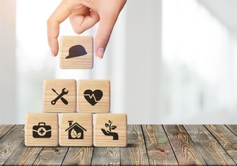 Health safety education icons on wooden cube - obrazy, fototapety, plakaty