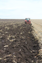 Fototapeta premium A tractor in a field