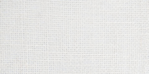 White jute hessian sackcloth canvas sack cloth woven texture pattern background in white light grey color