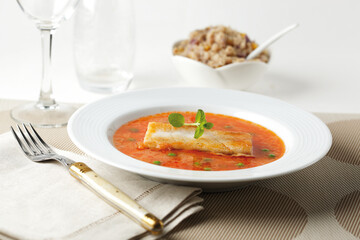 Spicy kiwichi soup with fish. Traditional Peruvian cuisine.