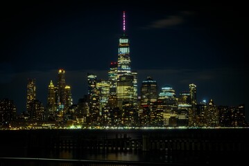 Stunning nighttime skyline of Manhattan with its illuminated buildings