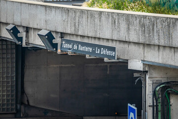 Entrance sign of the tunnel de Nanterre La Defense in Paris, France