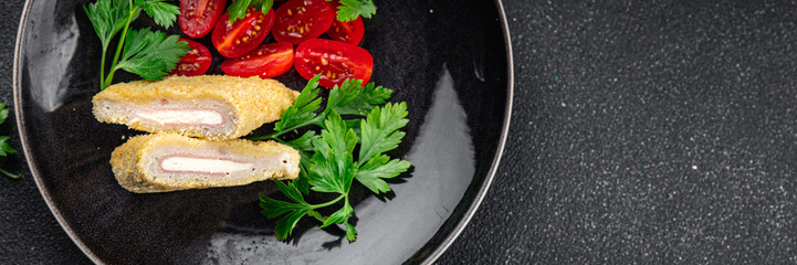 cordon bleu cutlet chicken meat, cheese, bacon snack meal food on the table copy space food...