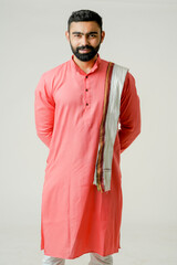 Young Indian farmer isolated in white.