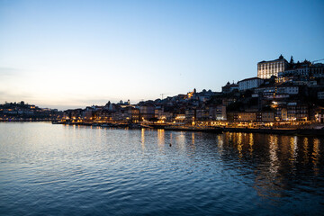 Fototapeta na wymiar Panoramic view of Porto with Duoro river in the evening, Night Porto cityscape