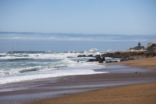 Praia de Carnero, sandy beach in Porto with big waves of the ocean, springtime