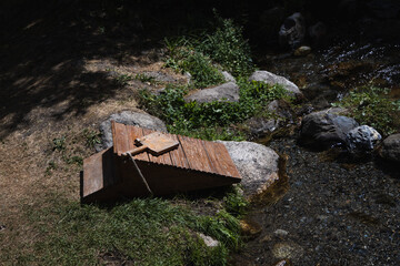 Vintage wooden washboard near the river, Pyrenees, Spain