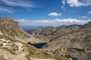 Beautiful landscape of the natural park of Aigestortes y Estany de Sant Maurici, Pyrenees valley with river and lake