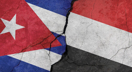 Naklejka premium Cuba and Yemen flags, concrete wall texture with cracks, grunge background, military conflict concept