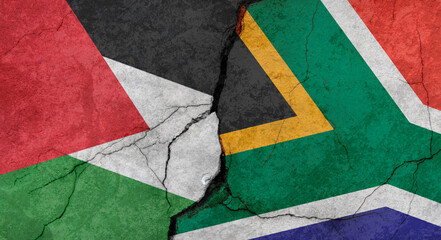 Palestine and South Africa flags, concrete wall texture with cracks, grunge background, military conflict concept