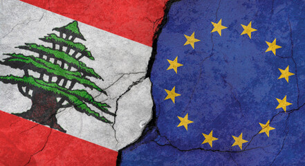 Lebanon and European Union flags, concrete wall texture with cracks, grunge background, military conflict concept