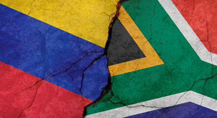 Venezuela and South Africa flags texture of concrete wall with cracks, grunge background, military conflict concept