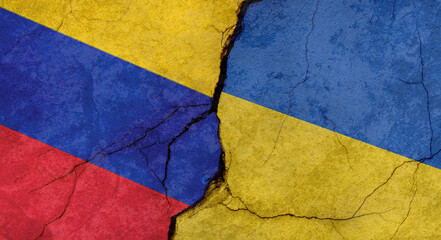 Flags of Venezuela and Ukraine texture of concrete wall with cracks, grunge background, military conflict concept