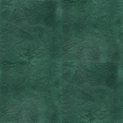 Seamless green background. Crumpled paper texture. 