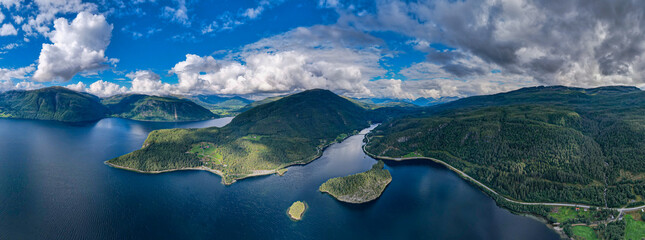 Aerial view of the Fjords and mountains in Norway lake during summertime  - obrazy, fototapety, plakaty