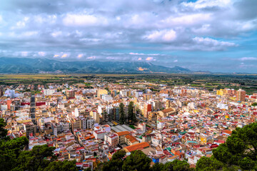 Cullera Spain town view with streets and buildings from the castle with mountains