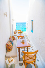 Mykonos, Greece. Wiew of whitewashed cycladic street in beautiful Mykonos town, Cyclades Greek Islands.