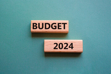 Budget 2024 symbol. Wooden blocks with words Budget 2024. Beautiful grey green background. Business and Budget 2024 concept. Copy space.