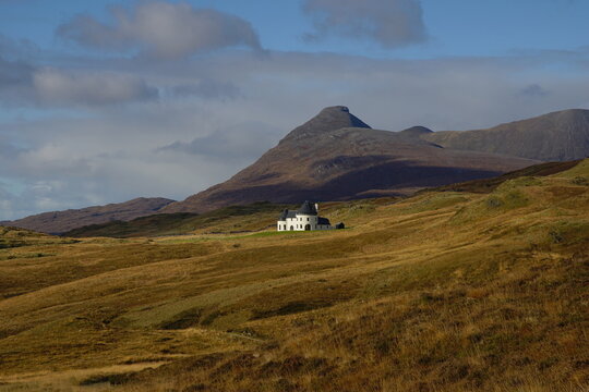 Inchnadamph House on the Inchnadamph Estate, Loch Assynt, Sutherland, North West Scotland, UK with Glas Bheinn (776m) behind.