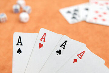 Playing cards. Orange background.Gambling, bridge, poker concept. Sport equipment