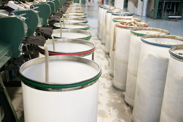 Industrial loom on textile .Flax processing plant, fabric production. Flax is made .A workshop at a textile factory.