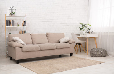 Modern room design with sofa, copy space