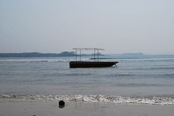 Fishing ship in the sea. South India, Village Colva or Kolva.