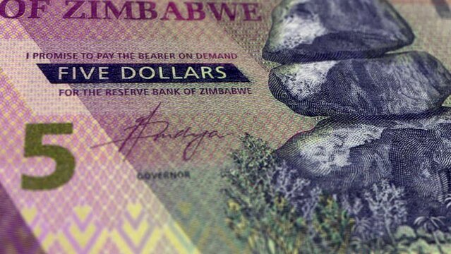 Zimbabwe Zimbabwean Dollar 5 Banknotes, Five Zimbabwean Dollar, Close-up and macro view of the Zimbabwean Dollar, Tracking and Dolly Shots 5 Zimbabwean Dollar banknote Observe and Reserve Side