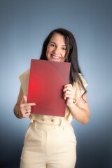 a female holding a re folder