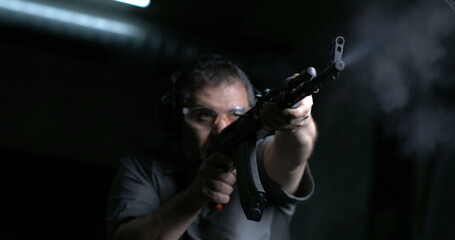 High-Speed 800fps Slow-Motion Shooting with AK-47, Man Aiming and Firing Kalashnikov Rifle,...
