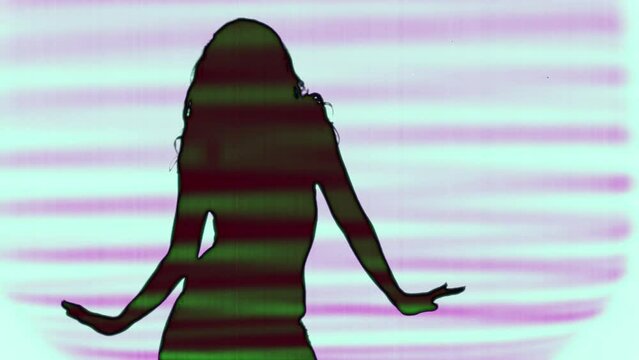 Beautiful female shadow silhouette dance
