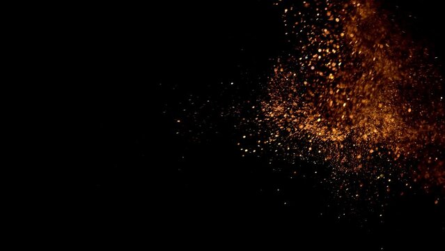 4K Multicolored abstract glitter particles. Shimmering Particles Falling glitter with glare on a bokeh background. Titles in awards, music, wedding, anniversary, party, and presentation backdrops.