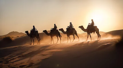 Türaufkleber Beduin's caravan in African desert at sunset © IRStone