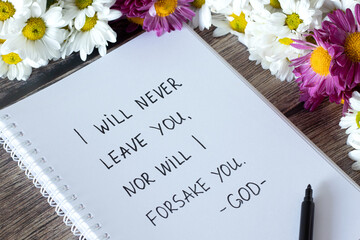 I will never leave you, nor will I forsake you, God. Encouraging Christian verse handwritten in...